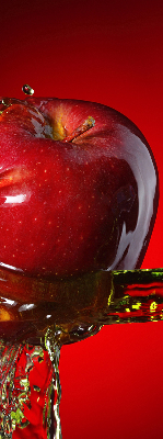 Blackout roller blind An apple doused with water