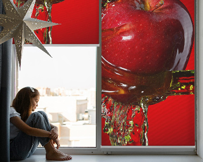 Blackout roller blind An apple doused with water