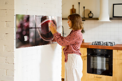 Magnetic kitchen board A glass of red wine