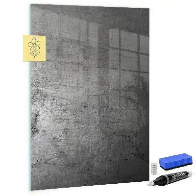 Dry erase magnetic board with a scratched metal finish