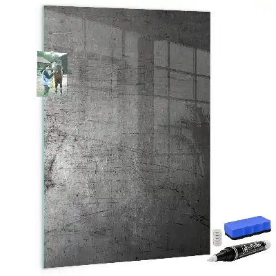 Dry erase magnetic board with a scratched metal finish