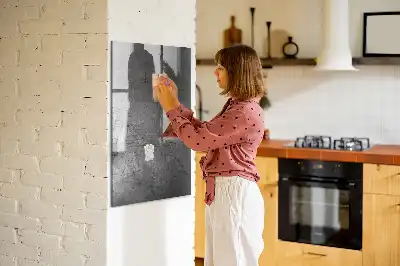 Dry erase magnetic board with a scratched metal finish