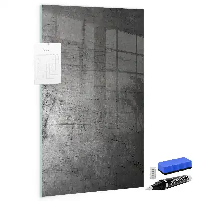 Dry erase magnetic board with a scratched metal finish