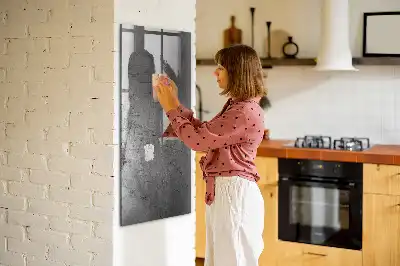Dry erase magnetic board with a scratched metal finish