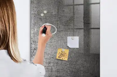 Dry erase magnetic board with a scratched metal finish