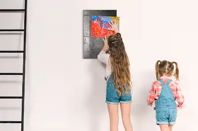 Dry erase magnetic board with a scratched metal finish