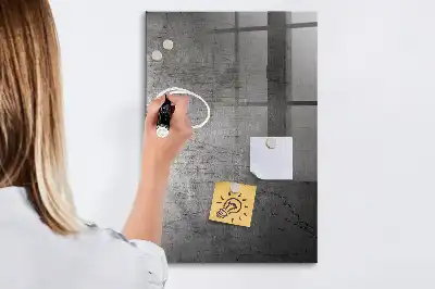 Dry erase magnetic board with a scratched metal finish