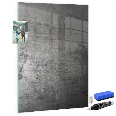 Dry erase magnetic board with a scratched metal finish