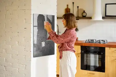 Dry erase magnetic board with a scratched metal finish