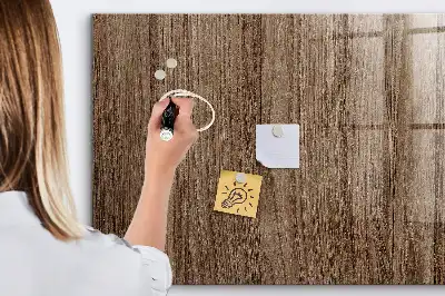 Magnetic erase board with a dark wood frame