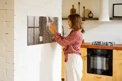 Magnetic erase board with a dark wood frame