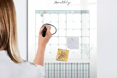 Monthly planner board with magnetic erase surface