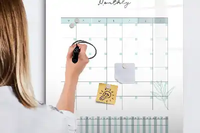 Monthly planner board with magnetic erase surface