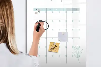 Monthly planner board with magnetic erase surface
