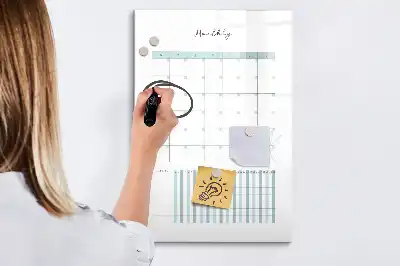 Monthly planner board with magnetic erase surface