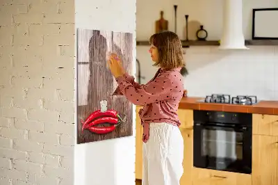 Magnetic erase board with wooden chili pepper design