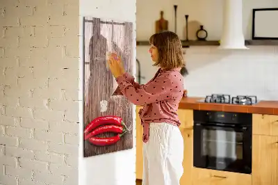 Magnetic erase board with wooden chili pepper design