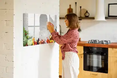 Magnetic marker board featuring a table with vegetables