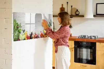 Magnetic marker board featuring a table with vegetables