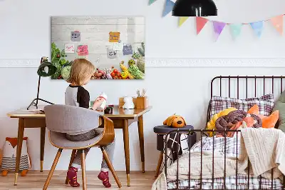 Magnetic marker board featuring a table with vegetables