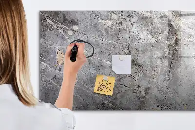 Magnetic glass dry erase board with a marble pattern