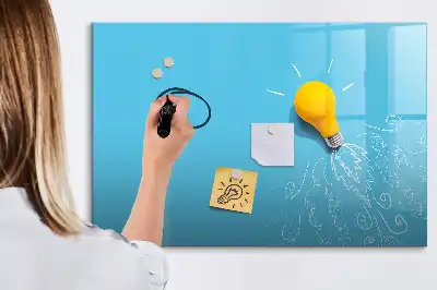 Magnetic glass dry erase board with light bulb drawing