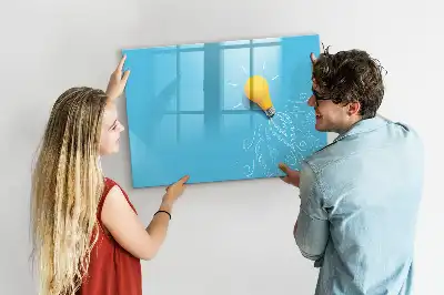 Magnetic glass dry erase board with light bulb drawing