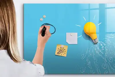 Magnetic glass dry erase board with light bulb drawing