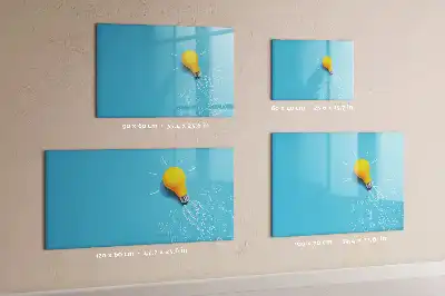 Magnetic glass dry erase board with light bulb drawing