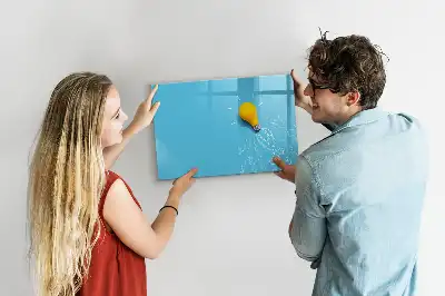 Magnetic glass dry erase board with light bulb drawing