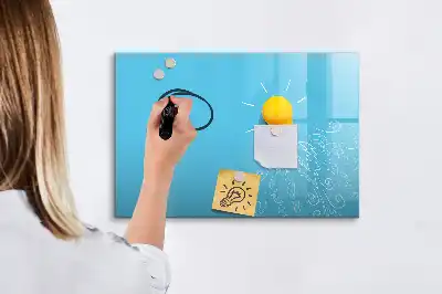 Magnetic glass dry erase board with light bulb drawing
