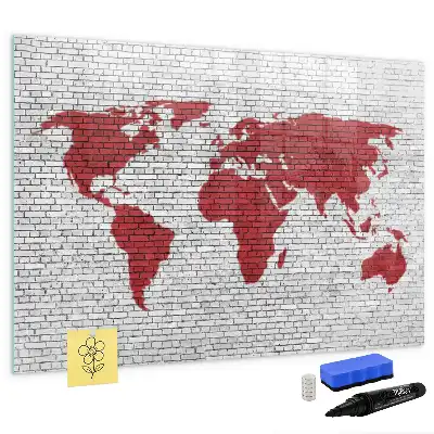 Magnetic marker board world map on brick wall