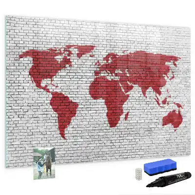 Magnetic marker board world map on brick wall