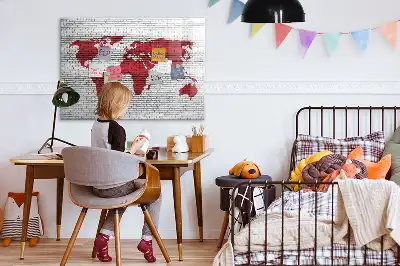 Magnetic marker board world map on brick wall