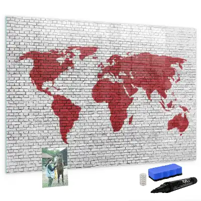 Magnetic marker board world map on brick wall