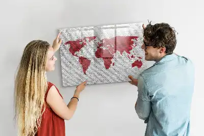 Magnetic marker board world map on brick wall