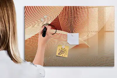 Magnetic marker board with an abstract wave pattern