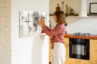 Magnetic marker board world map made from newspapers