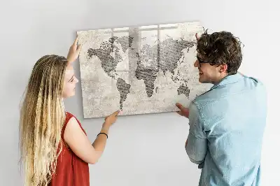 Magnetic marker board world map made from newspapers