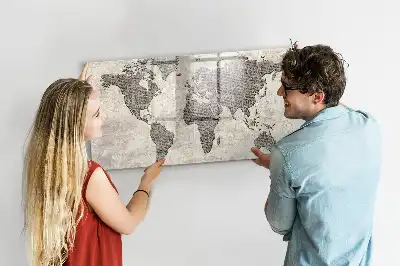 Magnetic marker board world map made from newspapers