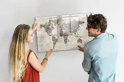 Magnetic marker board world map made from newspapers