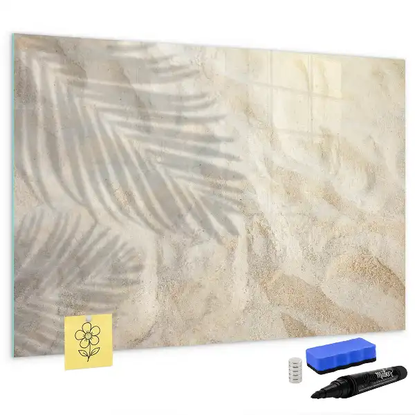 Magnetic glass dry erase board shadow on the sand