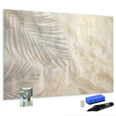 Magnetic glass dry erase board shadow on the sand