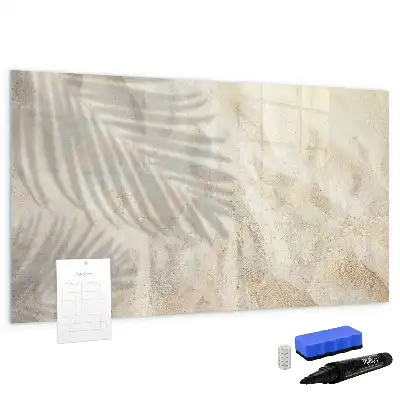 Magnetic glass dry erase board shadow on the sand