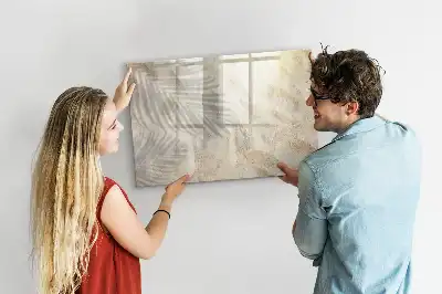 Magnetic glass dry erase board shadow on the sand
