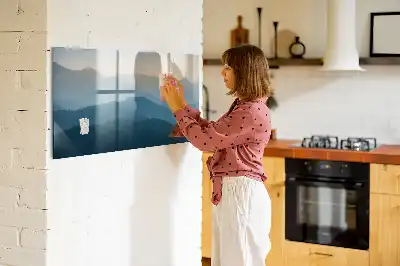 Magnetic glass dry erase board with landscape abstraction design
