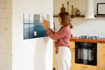 Magnetic glass dry erase board with landscape abstraction design