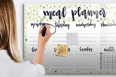 Magnetic marker board with weekly menu and stars motif