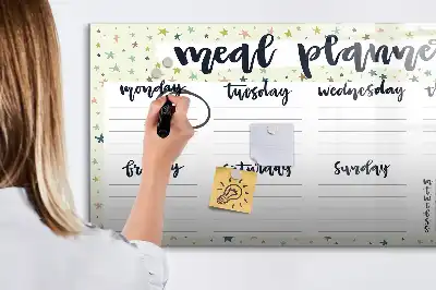Magnetic marker board with weekly menu and stars motif