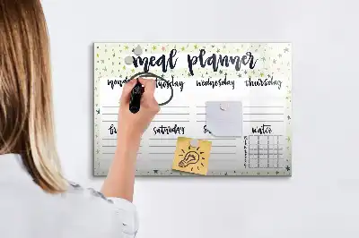 Magnetic marker board with weekly menu and stars motif